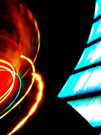 Low angle view of colorful lights