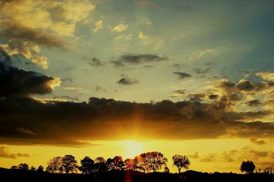 Sun shining through clouds