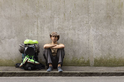 Full length of man skateboarding on wall