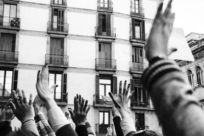 Group of people in front of buildings