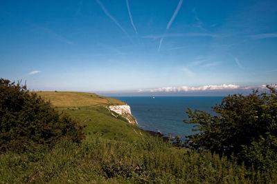 Scenic view of beach and sea against sky