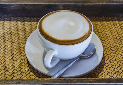 Close-up of cappuccino on table