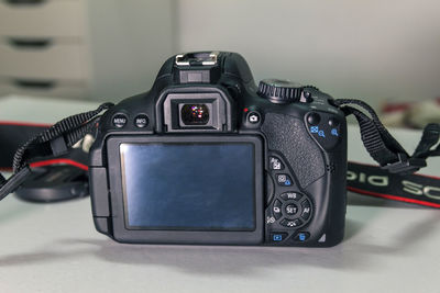 Close-up of camera on table