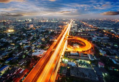 High angle view of illuminated city at night