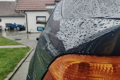 Car on street by house