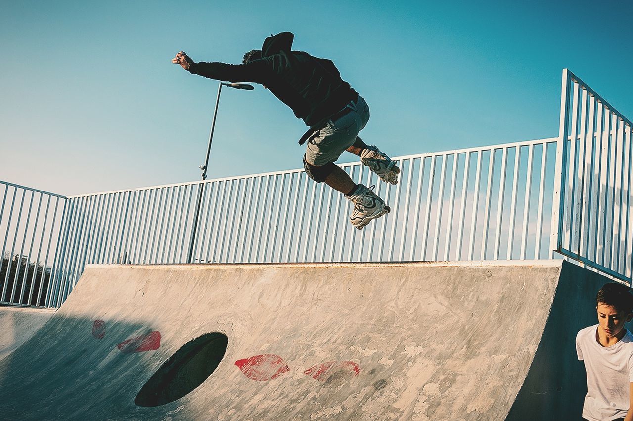 real people, mid-air, full length, jumping, sky, men, stunt, skateboard park, leisure activity, lifestyles, skateboard, one person, sport, nature, day, young men, sports equipment, skill, young adult, outdoors, human arm