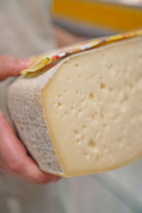 Close-up of hand holding bread
