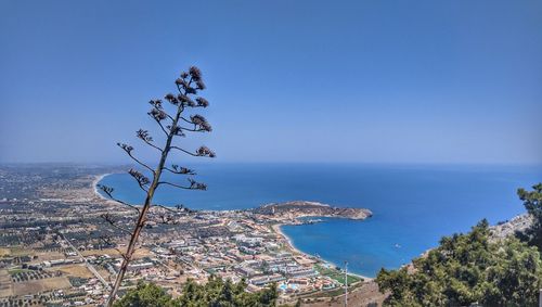 Scenic view of sea against clear blue sky