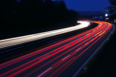 Light trails on road at night