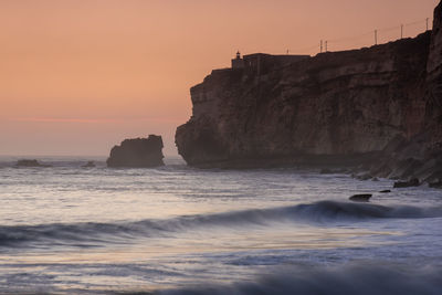 Scenic view of sea against sky during sunset