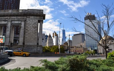 Manhattan bridge arch and freedom tower in lower east side of manhattan.