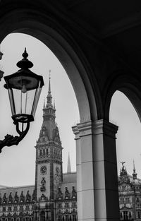 Clock tower against sky in city