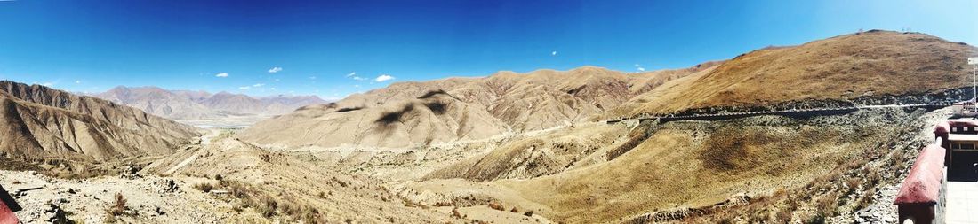 Panoramic view of landscape and mountains against sky