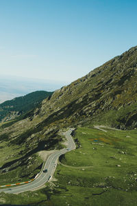 High angle view of road amidst landscape against sky