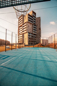 View of soccer field against blue sky