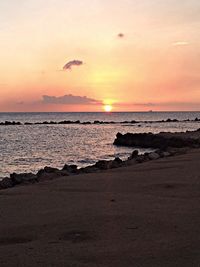 Scenic view of sea at sunset