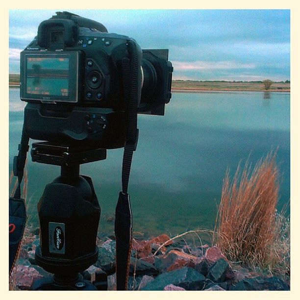 transfer print, auto post production filter, sky, water, technology, metal, sea, cloud - sky, reflection, close-up, protection, outdoors, cloud, tranquility, connection, no people, rusty, day, nature, lake