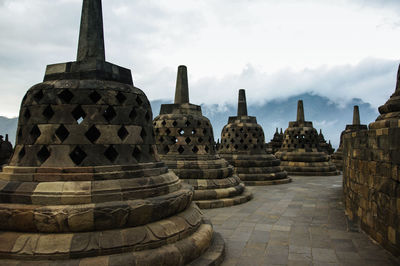 Borobodur temple java against cloudy sky