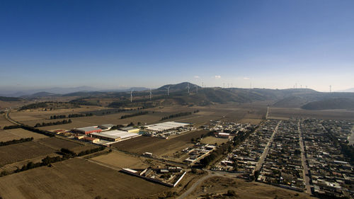 High angle view of buildings in city against clear sky