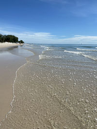 Scenic view of beach against sky