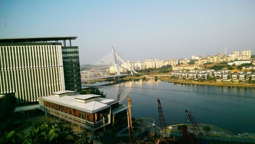 View of built structures against clear sky