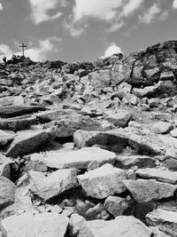 Rock formation on land against sky