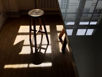 High angle view of table and chairs on floor