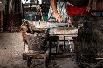 Man working on shopping cart