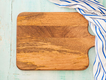 High angle view cutting board on table