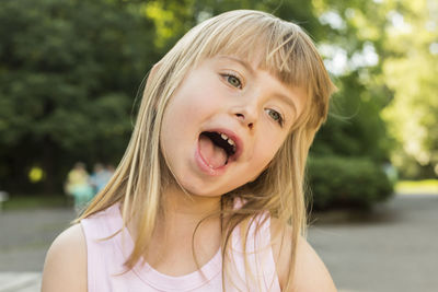 Close-up of girl with mouth open