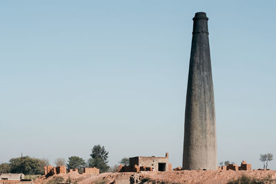 Chimney against clear sky