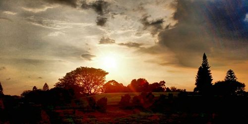 Scenic view of landscape at sunset