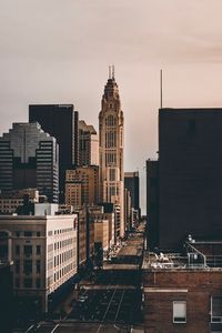 Buildings in city against sky