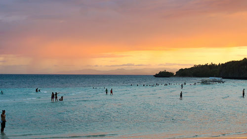 Scenic view of sea at sunset