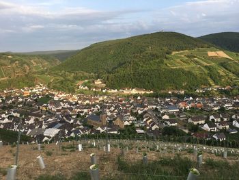 Scenic view of town against sky