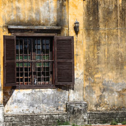 Open window on abandoned building