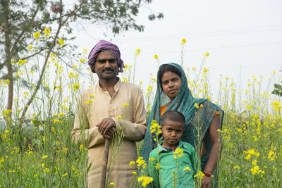 Portrait of happy family of indian farmer