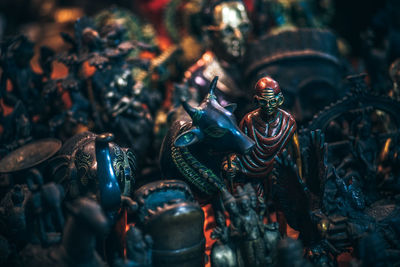 High angle view of figurines at market stall