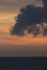 Scenic view of sea against sky at sunset