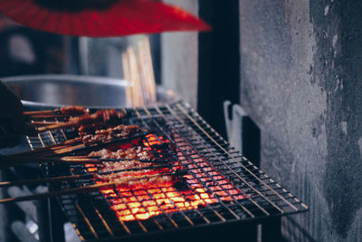 Close-up of meat on barbecue grill