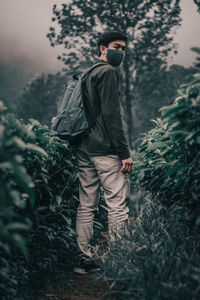 Full length of man walking on field