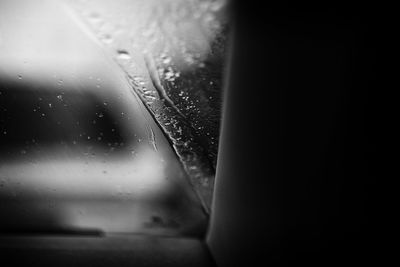 Close-up of raindrops on glass window