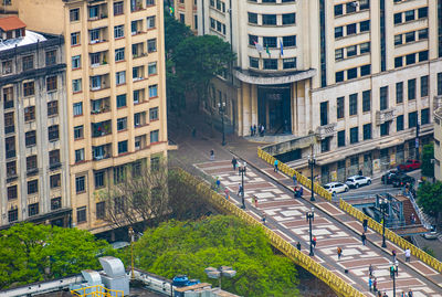 Aerial view of people crossing the santa ifigenia viaduct on downtown.