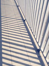 Close-up of shadow on tiled floor