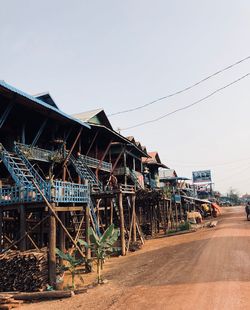 Metallic structure by building against clear sky