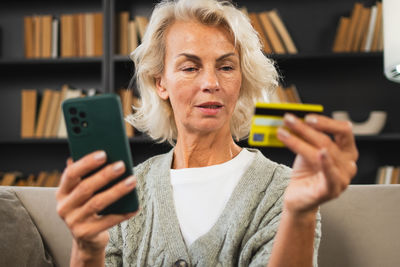 Young woman using mobile phone