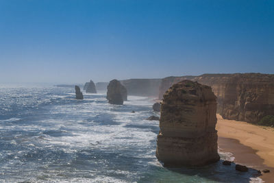 Scenic view of sea against blue sky
