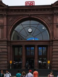 Group of people in front of building