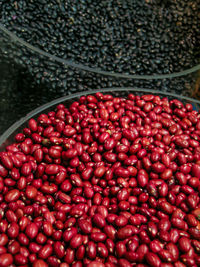 High angle view of black and red beans on market