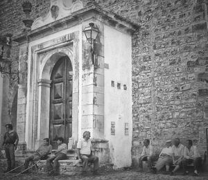 Group of people in front of building